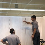 Brian Q, Installer - RDU, and Joe K, Market Manager - RDU, installing a laren closet model at TCS