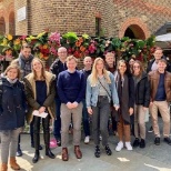 The London team poses for a team photo after a pricing workshop.