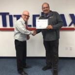 A TitleMax employee celebrating a work anniversary milestone!