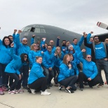 Wawanesa employees pull a plane in support of United Way!